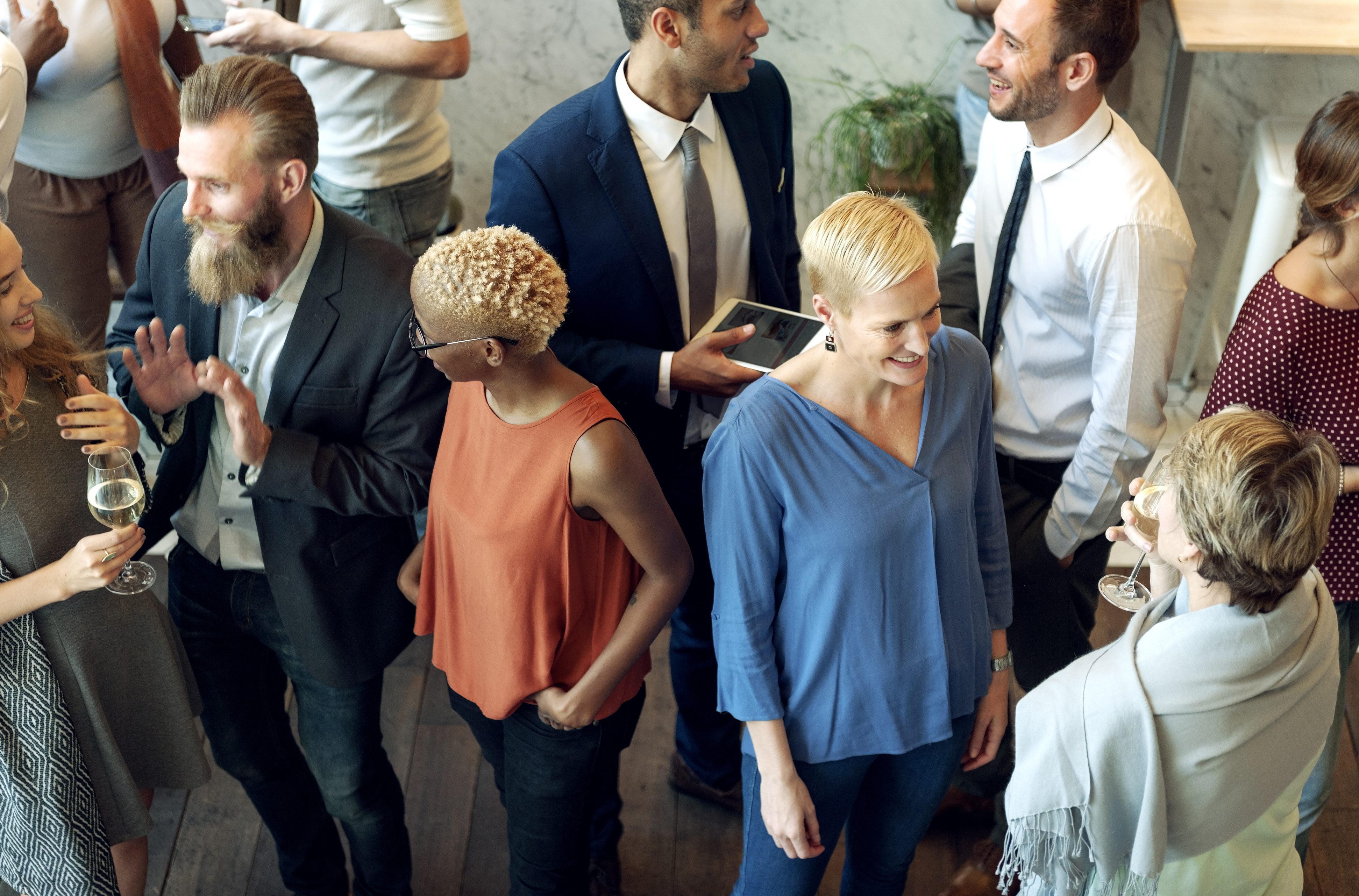 People talking at a networking event